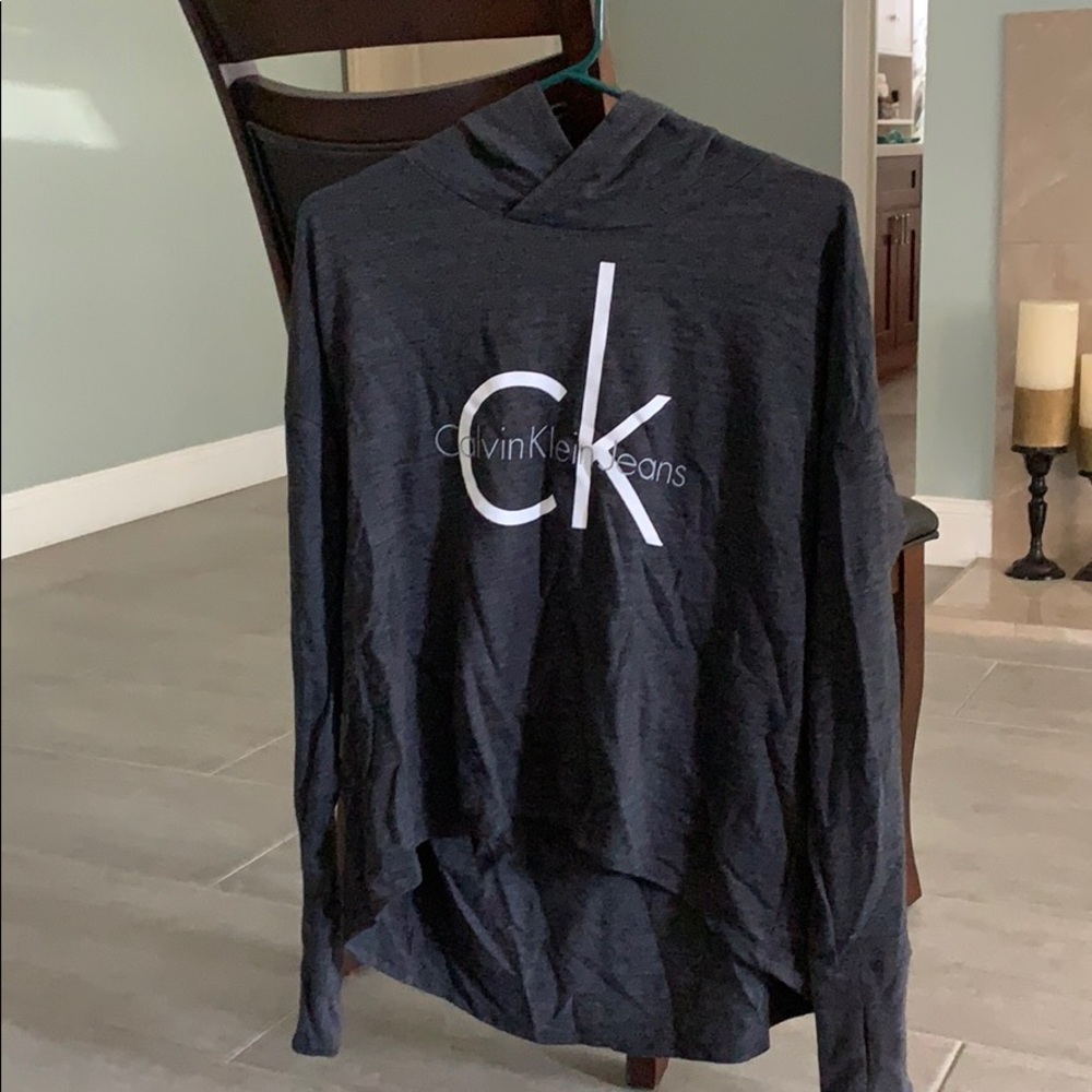 Dark grey sweatshirt.